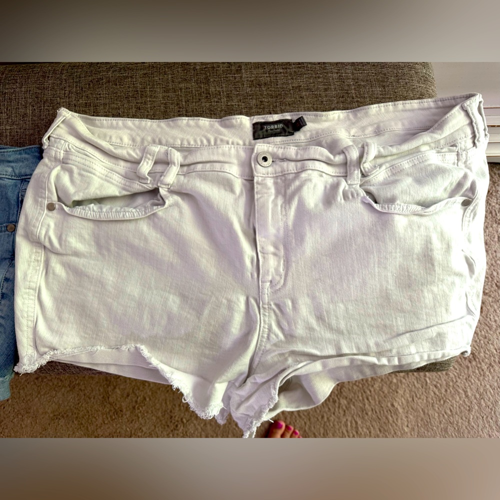 Torrid size 22 white jean shorts with ripped hem